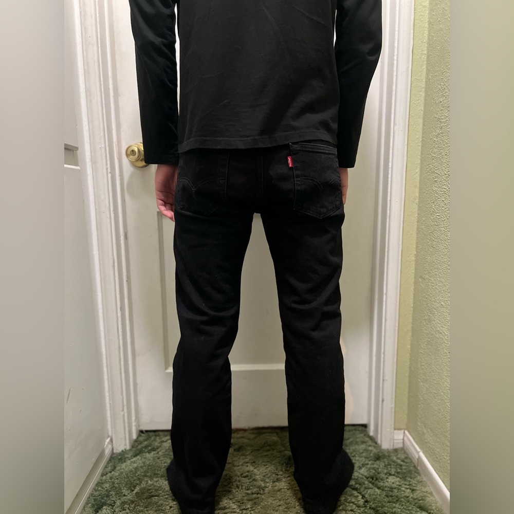 Washed out black Levi’s.
